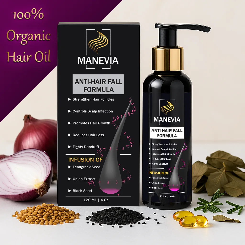 Glossy black herbal hair oil bottle with matte black box, surrounded by natural ingredients including onion, fenugreek seeds, black seed, dried curry leaves, rosemary, coconut, vitamin E capsules, orange, lemongrass, and mustard oil.